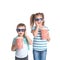 Cute children with popcorn and glasses on white