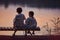 Cute children, siblings sitting on the bench by the lake at warm summer evening