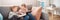 Cute children sitting on the soft sofa and reading books