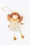 Cute Christmas angel figurine, white background.