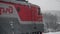 Cute christmas train goes through fantastic winter forest in slowmotion during snowfall. 1920x1080