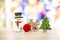 Cute Christmast decoration item over blurred colorful bokeh background