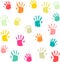 Cute and colorful baby palmprints seamless pattern