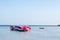 Cute colorful car catamarans tied on the lake