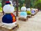 Cute colorful decorative statues on ginkgo tree-lined pathway in Nami Island South Korea