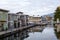 Cute, colourful floating houseboats line the docks in Mosquito Creek Marina, North Vancouver,