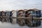 Cute, colourful floating houseboats line the docks in Mosquito Creek Marina, North Vancouver,