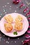 Cute Cookies Forming Small Pigs on Pink Plate