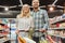 Cute couple grocery shopping together