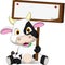 Cute cow cartoon with blank board