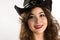 Cute Cowgirl in Black Hat on White Background