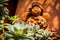 Cute cray angel doll with cactus in blurry background