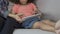 Cute curly girl playing game on tablet home, having fun with mother, parenting