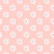Cute ditsy seamless pattern on light pink background. Doodle chamomile print