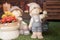 Cute dwarf. The stone statue of adorable gnomes for outdoor garden decoration