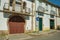 Cute facade of old house and awkward wooden door