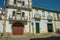 Cute facade of old house and awkward wooden door