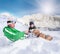 Cute family scene: father and son play with dog during mountain