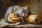 Cute Fluffy Gray Kitten Lounging on Warm Golden Croissants on Rustic Table Setting