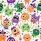 Cute and funny seamless vector pattern with silly Halloween monsters