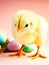 Cute fuzzy baby chick with Easter eggs greeting card