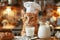 A cute ginger cat in chef\\\'s hat with glass and jug of milk on table on blurred kitchen background.