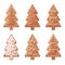 Cute gingerbread set. Christmas gingerbread in the shape of Christmas trees. Festive pastries. A collection of Christmas