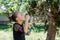 Cute girl blowing soap bubbles