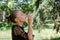 Cute girl blowing soap bubbles