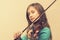 Cute girl in a blue dress with a violin. toned. copy space