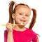 Cute girl brushing teeth with yellow toothbrush