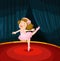 Cute girl dancing ballet on the stage