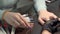 Cute girl gets a manicure in the salon for nail art.