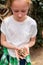 Cute girl holding baby tortoise