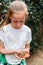 Cute girl holding baby tortoise