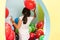 Cute girl playing with colorful balloons during playtime at the kindergarten