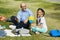 Cute Girl Posing with Teacher during Outdoor Lesson