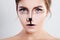 Cute Girl with Reindeer Animal Makeup. Face Closeup