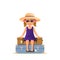 Cute girl in sunglasses sitting on the stack suitcases. Travel and vacation concept. Child with luggage