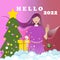 Cute girl waving hand to New Year. Text Hello 2022