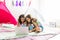 Cute Girls Enjoying Movie On Laptop During Sleepover Party