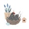 Cute grape hyacinth pot and dappled hen sitting in the decorated Easter nest. Spring and happy Easter composition