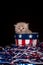 Cute gray kitten and Fourth of July decorations