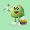Cute green monster holding spanner and tolls box