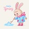 Cute greeting card with a bunny who launches a boat in a spring puddle. Vector illustration with animal