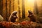 Cute groundhogs in the autumn forest with autumn leaves