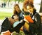 Cute group teenages at the building of university with books huggings, diversity nations