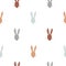 Cute hand drawn rabbit heads seamless pattern. Easter print for wallpaper or fabric. Vector illustration