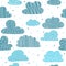 Cute hand drawn seamless pattern with clouds. Funny background