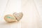 Cute handmade heart and glitter love word on stone